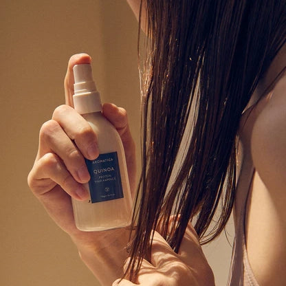 Izsmidzināms serums bojātiem matiem ar peptīdiem Aromatica Quinoa Protein Hair Ampoule