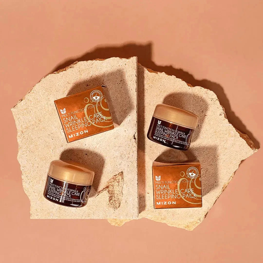 Nakts pretnovecošanās maska ar gliemežu ekstraktu Mizon Snail Wrinkle Care Sleeping Pack