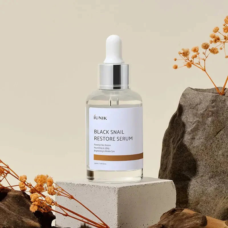 Serums ar melnā gliemeža mucīnu ādas atjaunošanai iUnik Black Snail Restore Serum