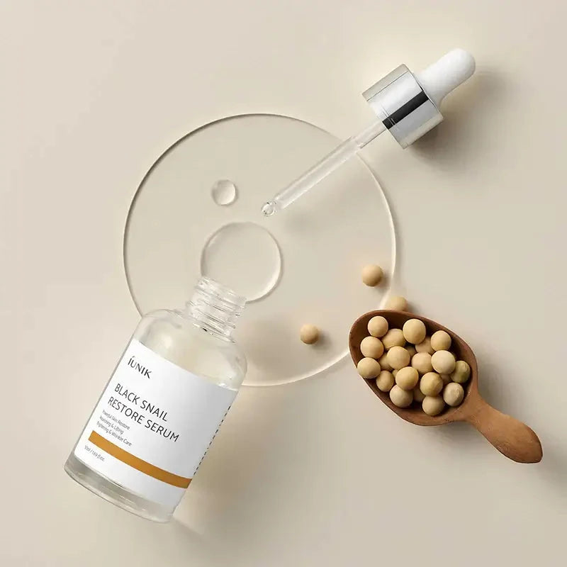 Serums ar melnā gliemeža mucīnu ādas atjaunošanai iUnik Black Snail Restore Serum